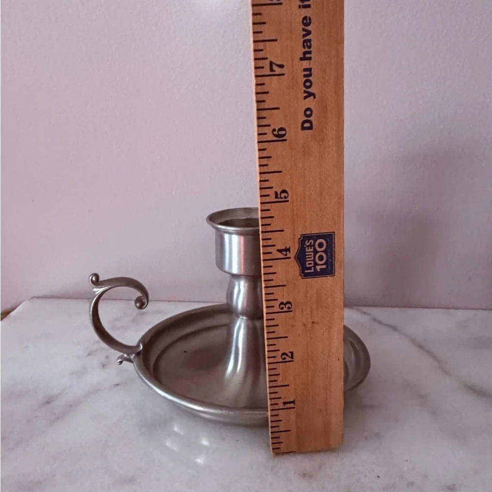 an Early American Pewter by Web chamberstick candle holder